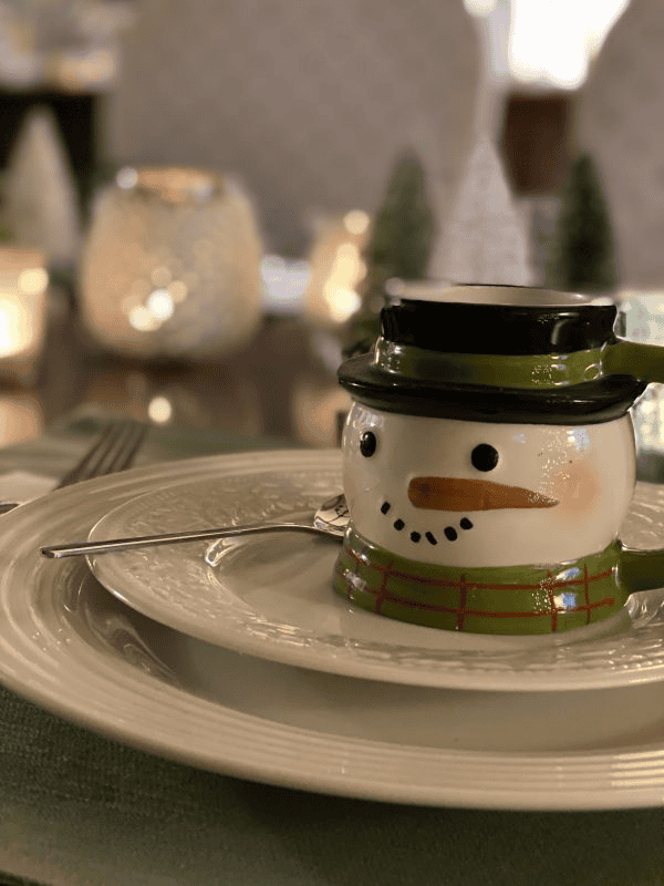winter tablescape with snoman mugs