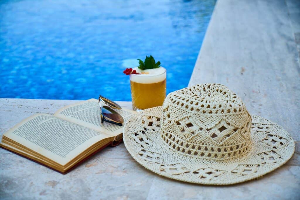relaxing items by a pool