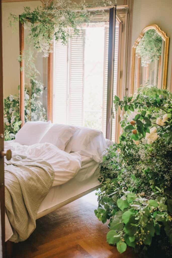 bedroom with open window and plants